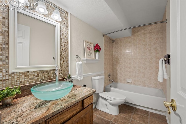 206 Luxury Ln, Colorado Springs, CO 80921 - full bath with vanity,  shower combination, and tile patterned flooring