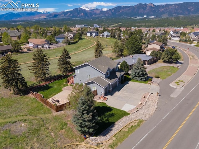 14095 Gleneagle Dr, Colorado Springs, CO 80921 - aerial view of property and surrounding area with nearby suburban area and mountains