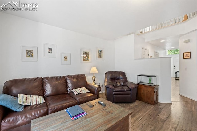 1749 Victorian Pt, Colorado Springs, CO 80905 - living area with wood finished floors and baseboards