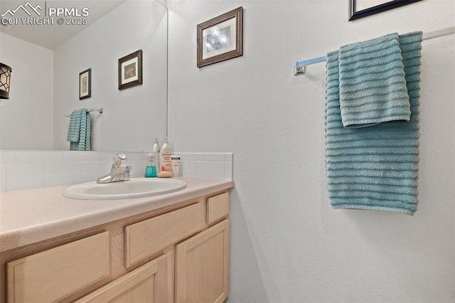 1749 Victorian Pt, Colorado Springs, CO 80905 - bathroom featuring tasteful backsplash and vanity
