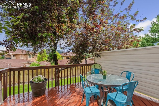 1749 Victorian Pt, Colorado Springs, CO 80905 - wooden terrace featuring outdoor dining area
