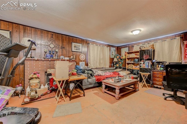 128 W Eaton Ave, Cripple Creek, CO 80813 - interior space featuring a textured ceiling, concrete flooring, and wood walls