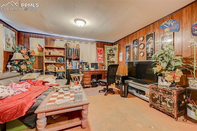 128 W Eaton Ave, Cripple Creek, CO 80813 - office area with wood walls and a textured ceiling