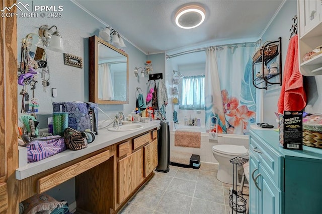 128 W Eaton Ave, Cripple Creek, CO 80813 - full bathroom with crown molding, tile patterned floors, vanity, and toilet