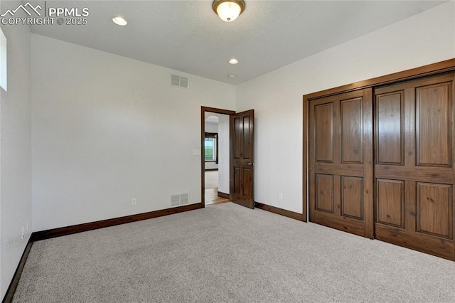 11354 Mckissick Rd, Peyton, CO 80831 - unfurnished bedroom with carpet flooring and recessed lighting