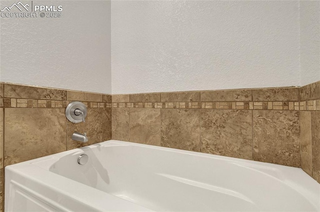 11354 Mckissick Rd, Peyton, CO 80831 - full bath with a textured wall and a bath