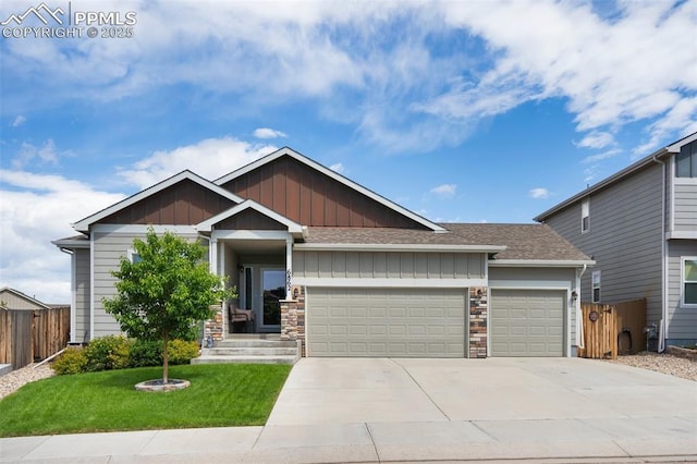6862 Simcoe Dr, Colorado Springs, CO 80925 - craftsman house with an attached garage, board and batten siding, driveway, roof with shingles, and stone siding