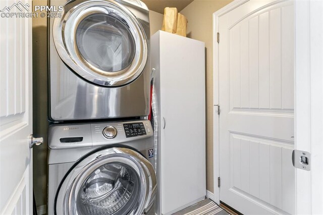 6862 Simcoe Dr, Colorado Springs, CO 80925 - washroom with stacked washer / dryer