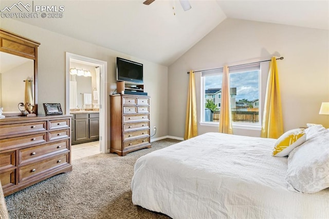 6862 Simcoe Dr, Colorado Springs, CO 80925 - bedroom featuring light carpet, lofted ceiling, connected bathroom, ceiling fan, and a sink