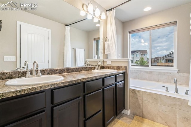 6862 Simcoe Dr, Colorado Springs, CO 80925 - full bath with a bath, double vanity, and tile patterned flooring