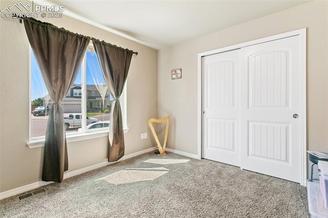 6862 Simcoe Dr, Colorado Springs, CO 80925 - unfurnished bedroom featuring carpet, a closet, and baseboards