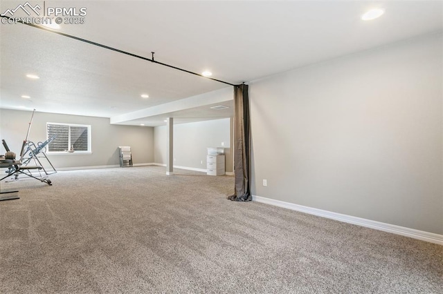 6862 Simcoe Dr, Colorado Springs, CO 80925 - finished below grade area featuring carpet flooring, recessed lighting, and baseboards