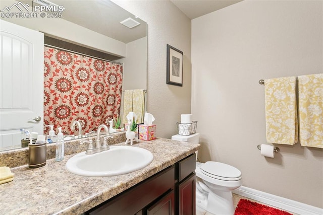 6862 Simcoe Dr, Colorado Springs, CO 80925 - bathroom with vanity, toilet, and a shower with shower curtain