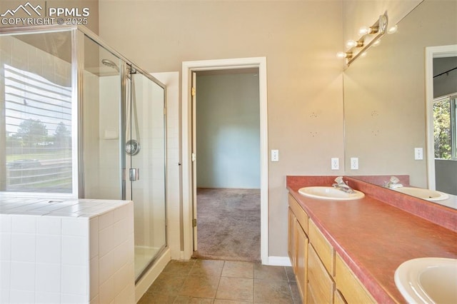 55 Misty Creek Dr, Monument, CO 80132 - full bath with tile patterned floors, a stall shower, and double vanity
