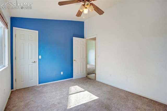 55 Misty Creek Dr, Monument, CO 80132 - unfurnished bedroom featuring carpet floors, a ceiling fan, and lofted ceiling