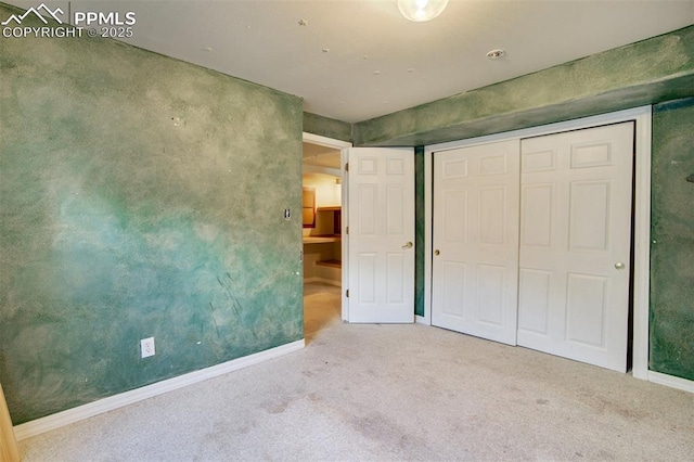 55 Misty Creek Dr, Monument, CO 80132 - unfurnished bedroom featuring carpet and a closet