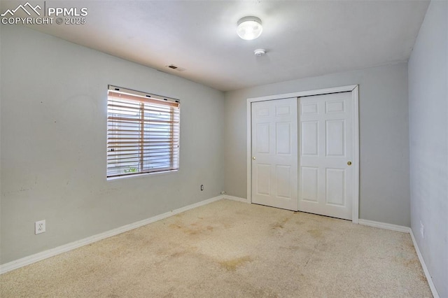 55 Misty Creek Dr, Monument, CO 80132 - unfurnished bedroom with carpet and a closet