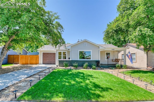 1445 N Foote Ave, Colorado Springs, CO 80909 - ranch-style house with driveway, a garage, and a porch