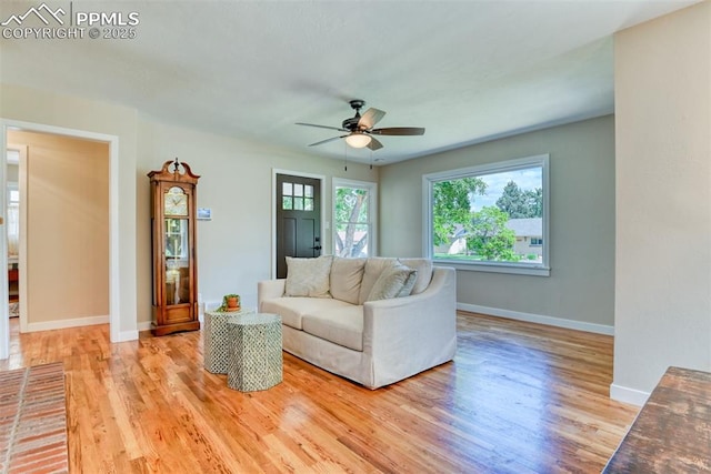 1445 N Foote Ave, Colorado Springs, CO 80909 - living room featuring light wood-type flooring and ceiling fan