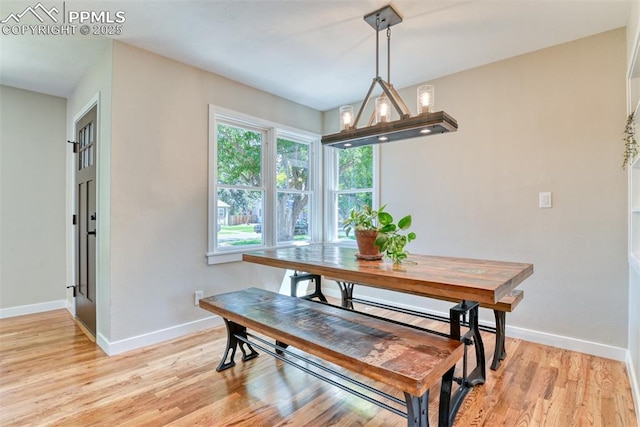 1445 N Foote Ave, Colorado Springs, CO 80909 - dining area with baseboards and light wood-type flooring