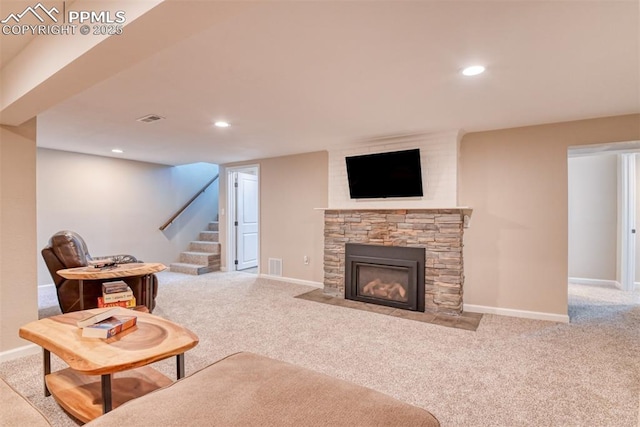 1445 N Foote Ave, Colorado Springs, CO 80909 - carpeted living room with stairway, a fireplace, and recessed lighting