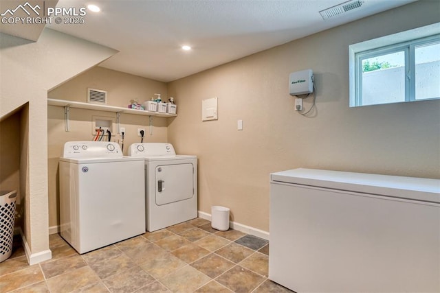 1445 N Foote Ave, Colorado Springs, CO 80909 - washroom with separate washer and dryer and recessed lighting