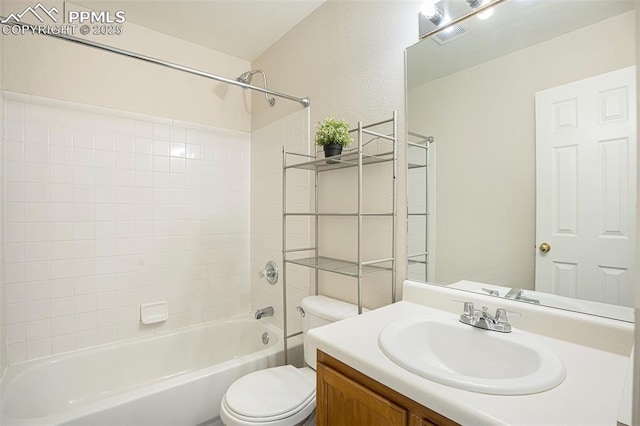 4585 W Jet Wing Cir, Colorado Springs, CO 80916 - full bathroom featuring toilet, vanity, and shower / washtub combination