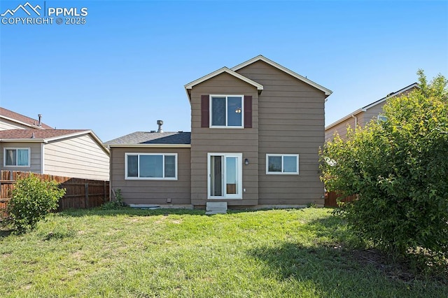 4585 W Jet Wing Cir, Colorado Springs, CO 80916 - rear view of property with roof with shingles