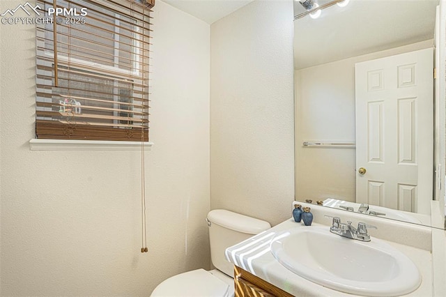 4585 W Jet Wing Cir, Colorado Springs, CO 80916 - half bath with toilet and vanity