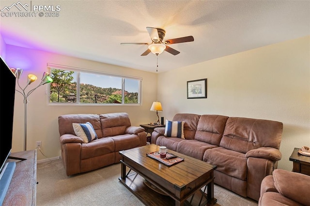 443 E Fountain Pl, Manitou Springs, CO 80829 - living room with light carpet, a ceiling fan, and baseboards