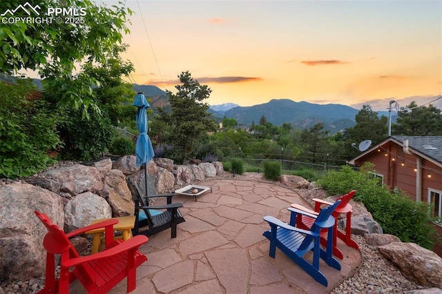 443 E Fountain Pl, Manitou Springs, CO 80829 - view of patio / terrace with a mountain view and a fire pit