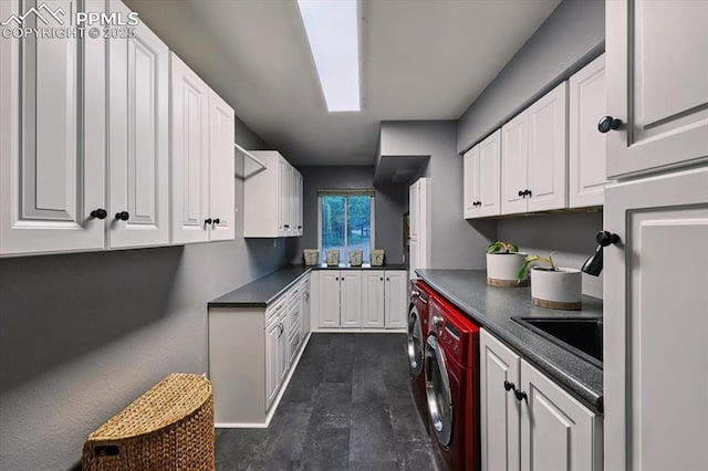 78 Raven Hills Ct, Colorado Springs, CO 80919 - laundry room with cabinet space and independent washer and dryer