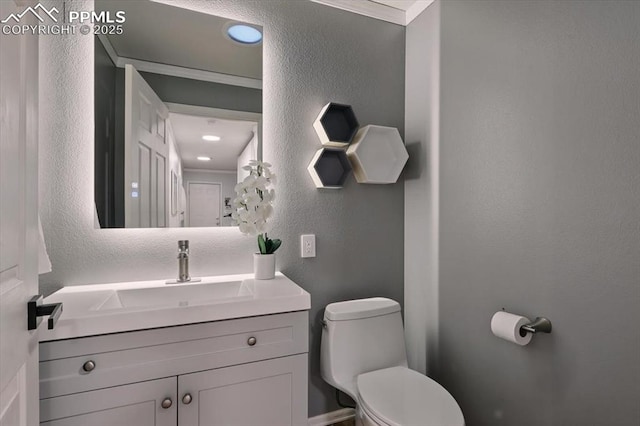 78 Raven Hills Ct, Colorado Springs, CO 80919 - half bathroom featuring a textured wall and vanity