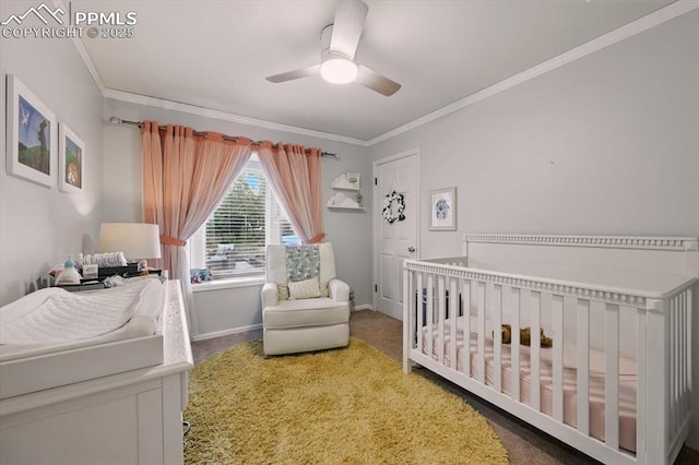 78 Raven Hills Ct, Colorado Springs, CO 80919 - carpeted bedroom with ornamental molding, a nursery area, and a ceiling fan
