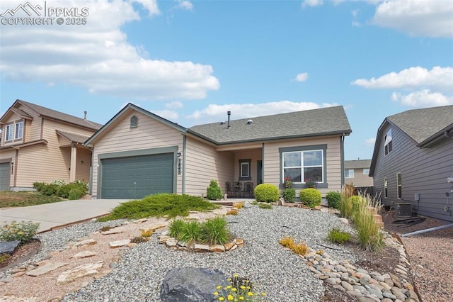 7845 Morning Dew Rd, Colorado Springs, CO 80908 - view of front facade featuring an attached garage and driveway