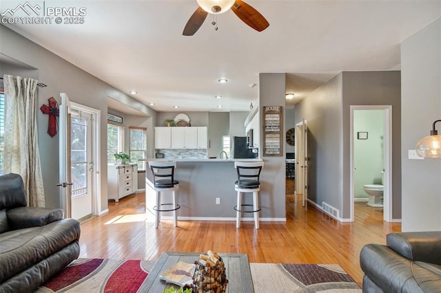 6055 Fescue Dr, Colorado Springs, CO 80923 - living area with a ceiling fan, light wood-style flooring, and recessed lighting
