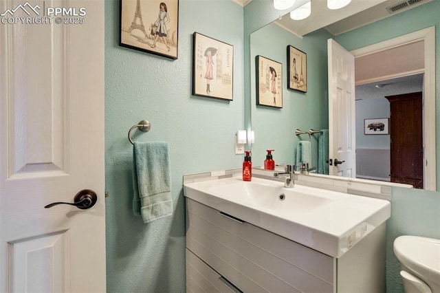 6055 Fescue Dr, Colorado Springs, CO 80923 - half bath with vanity and toilet