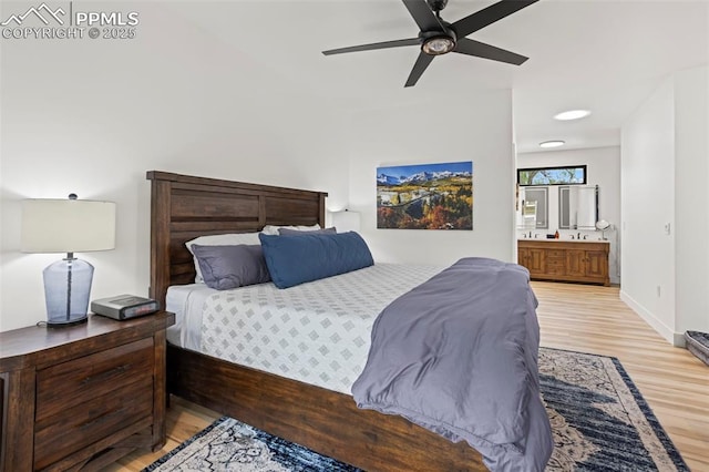 1607 W Pikes Peak Ave, Colorado Springs, CO 80904 - bedroom with light wood-style floors, ensuite bath, and ceiling fan