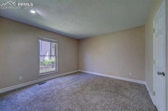 2928 Nevermind Ln, Colorado Springs, CO 80917 - carpeted empty room with a textured ceiling and baseboards