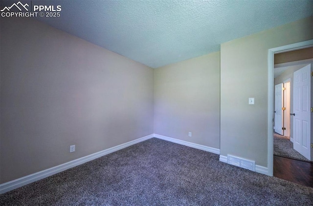 2928 Nevermind Ln, Colorado Springs, CO 80917 - spare room featuring carpet and a textured ceiling
