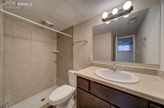 2928 Nevermind Ln, Colorado Springs, CO 80917 - full bathroom featuring vanity and a tile shower