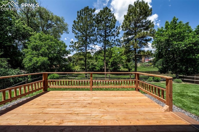 2928 Nevermind Ln, Colorado Springs, CO 80917 - deck with a yard and view of scattered trees