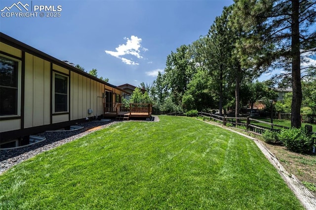 2928 Nevermind Ln, Colorado Springs, CO 80917 - view of yard with a wooden deck