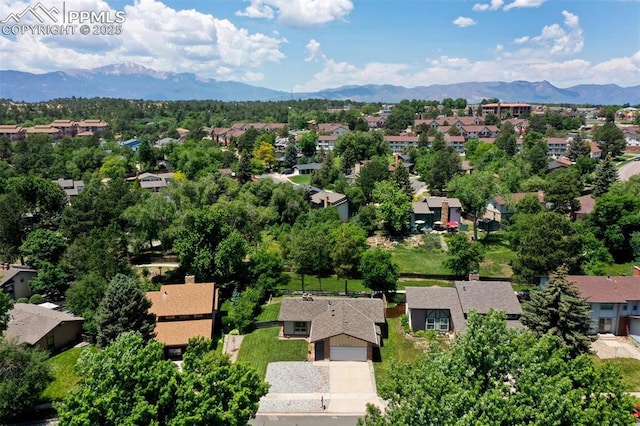 2928 Nevermind Ln, Colorado Springs, CO 80917 - aerial view of residential area with mountains