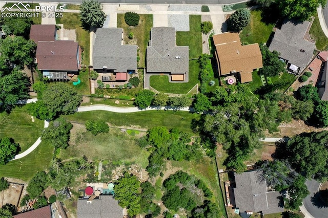 2928 Nevermind Ln, Colorado Springs, CO 80917 - aerial view of property and surrounding area with nearby suburban area