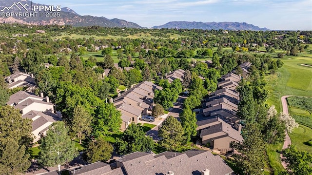 55 Woodbridge Dr, Colorado Springs, CO 80906 - aerial overview of property's location with nearby suburban area