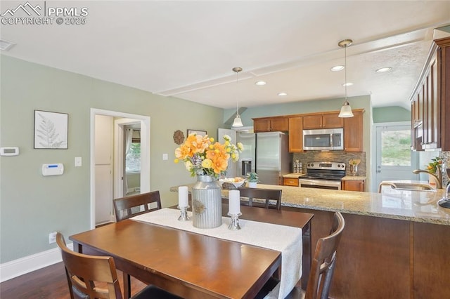 2144 Glenn St, Colorado Springs, CO 80904 - dining area with baseboards, dark wood-type flooring, and recessed lighting