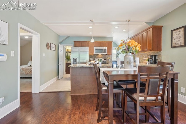 2144 Glenn St, Colorado Springs, CO 80904 - dining area with wood finished floors, baseboards, and recessed lighting
