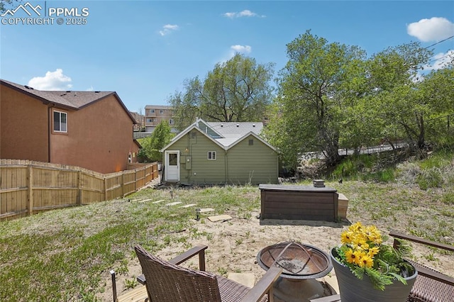 2144 Glenn St, Colorado Springs, CO 80904 - view of yard featuring an outdoor fire pit