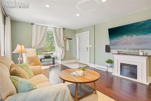 2144 Glenn St, Colorado Springs, CO 80904 - living area featuring wood finished floors, recessed lighting, baseboards, and a glass covered fireplace